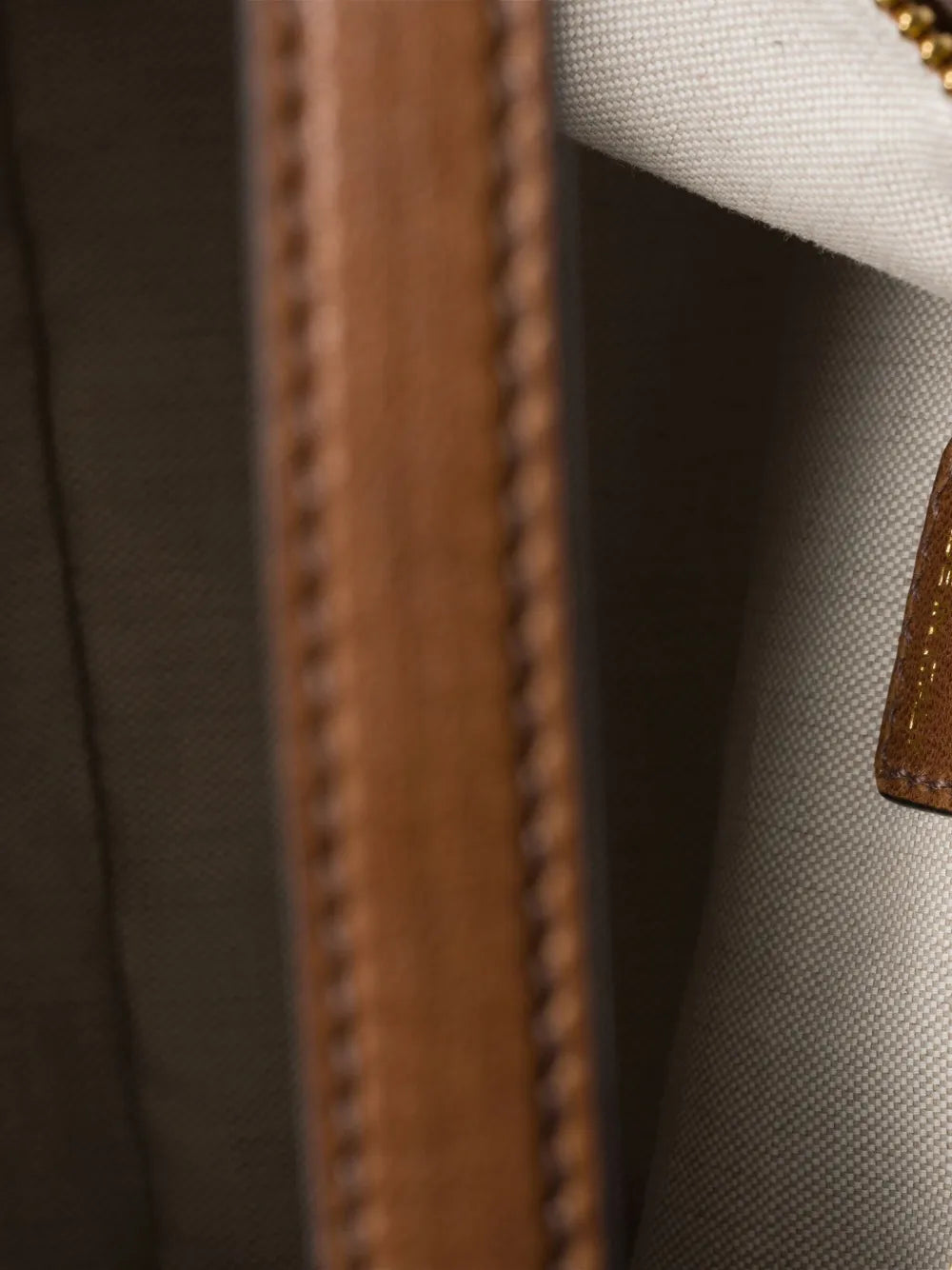 Miu Miu Logo Embossed Shoulder Bag